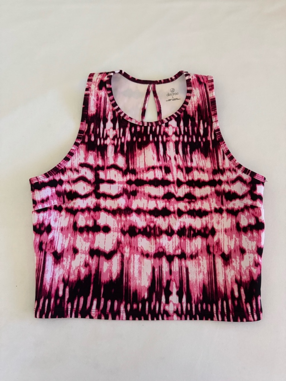 NWOT Decree cropped tank size large.  92% polyester/8% spandex.  Super stretchy!